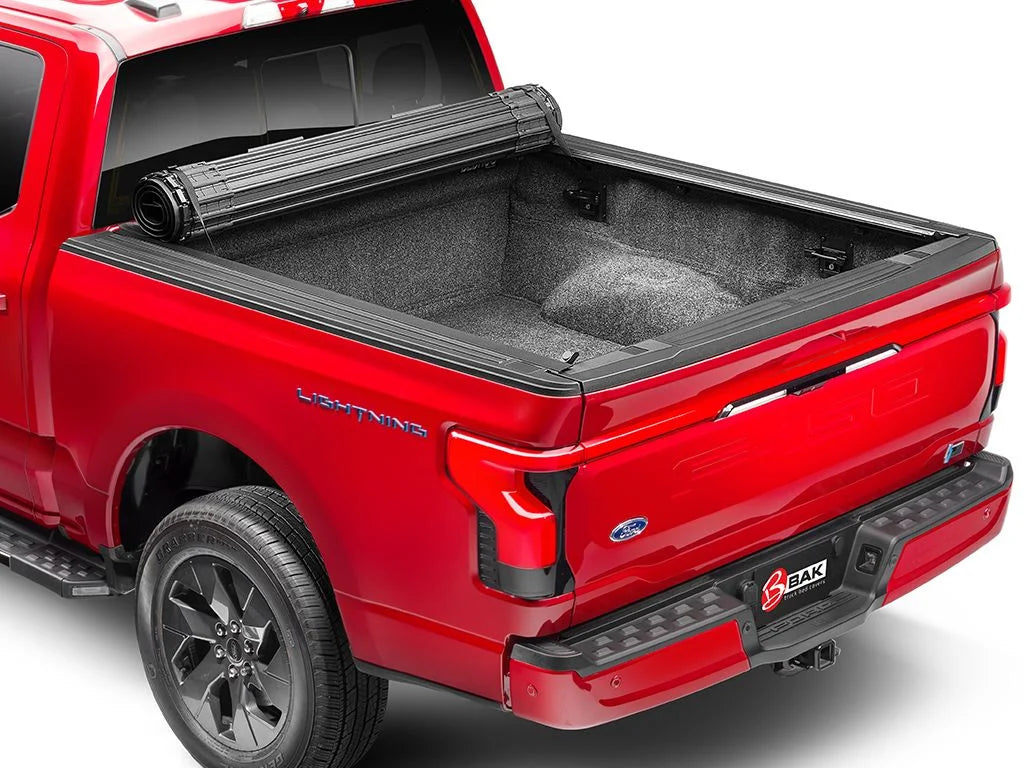 by RealTruck Revolver X4s Hard Rolling Truck Bed Tonneau Cover | 80506 | Compatible with 2005 - 2021 Nissan Frontier (w/Factory Bed Rail Caps Only) 4' 11" Bed (58.6")