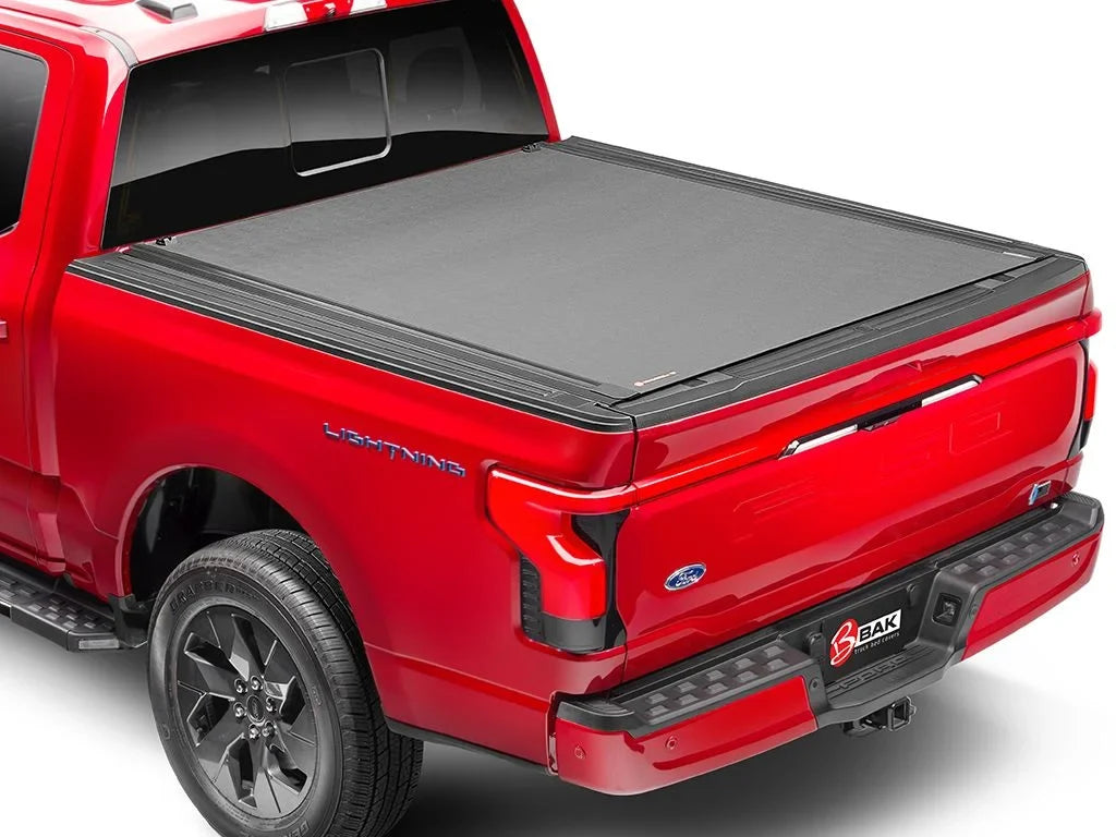 by RealTruck Revolver X4s Hard Rolling Truck Bed Tonneau Cover | 80506 | Compatible with 2005 - 2021 Nissan Frontier (w/Factory Bed Rail Caps Only) 4' 11" Bed (58.6")