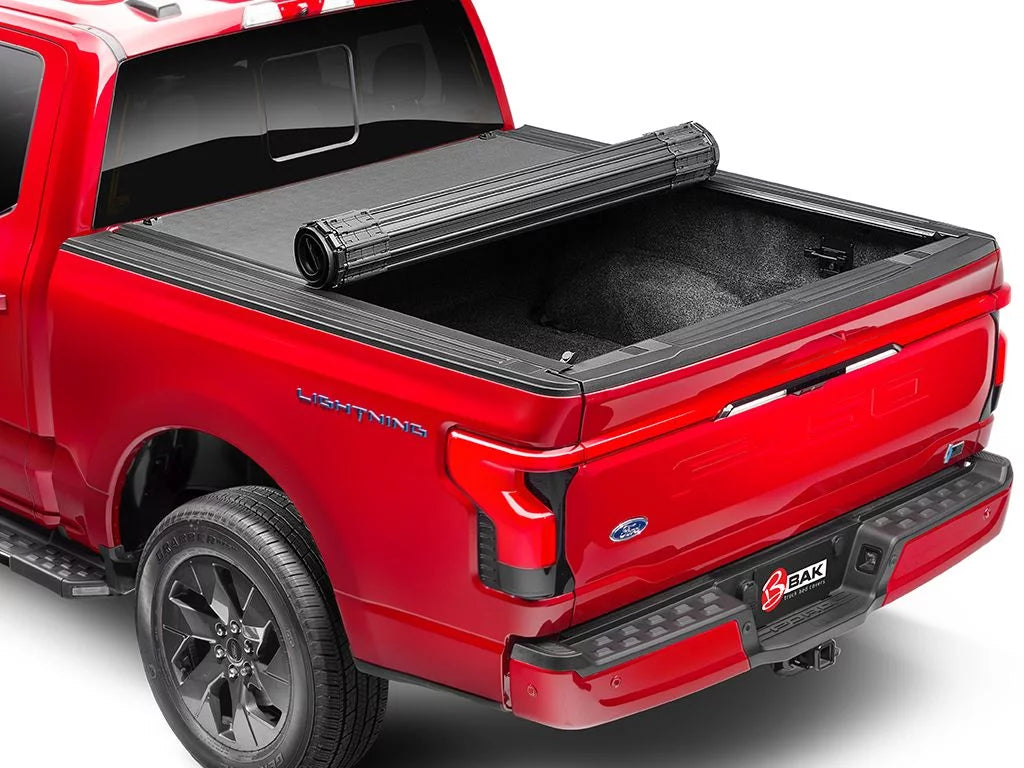 by RealTruck Revolver X4s Hard Rolling Truck Bed Tonneau Cover | 80506 | Compatible with 2005 - 2021 Nissan Frontier (w/Factory Bed Rail Caps Only) 4' 11" Bed (58.6")
